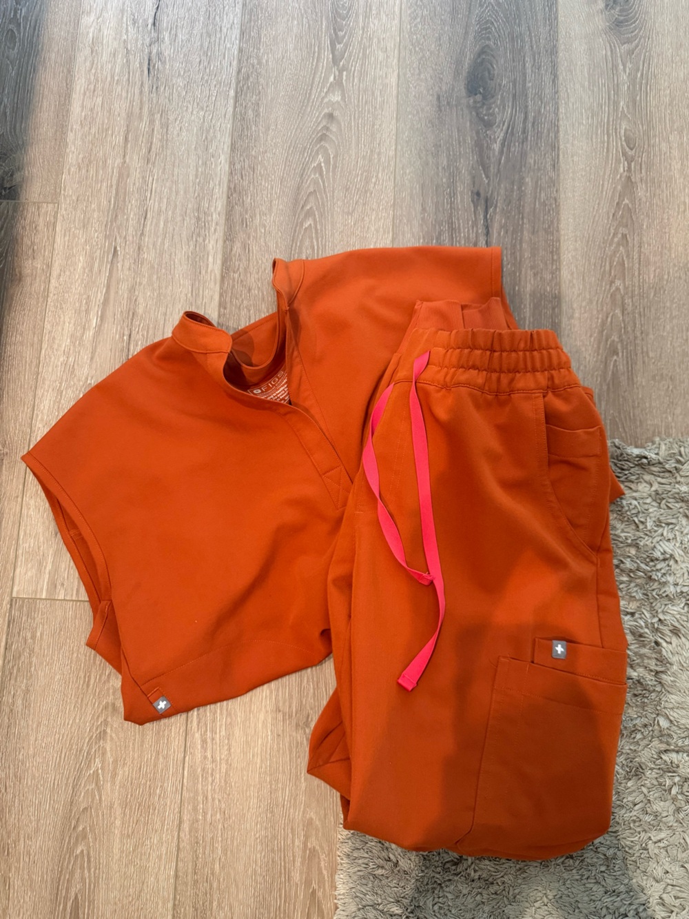 Figs Women's Orange Scrub Set with Pink Drawstring